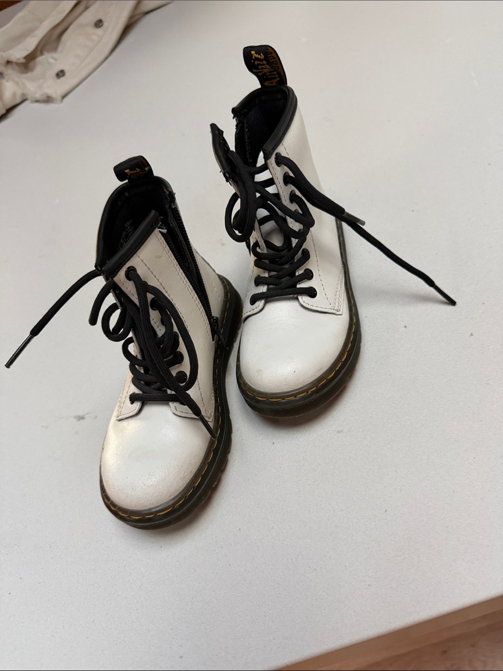 Dr. Martens White Lace-Up Combat Boots with Black Trim